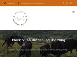 Blackandtandachshundboarding